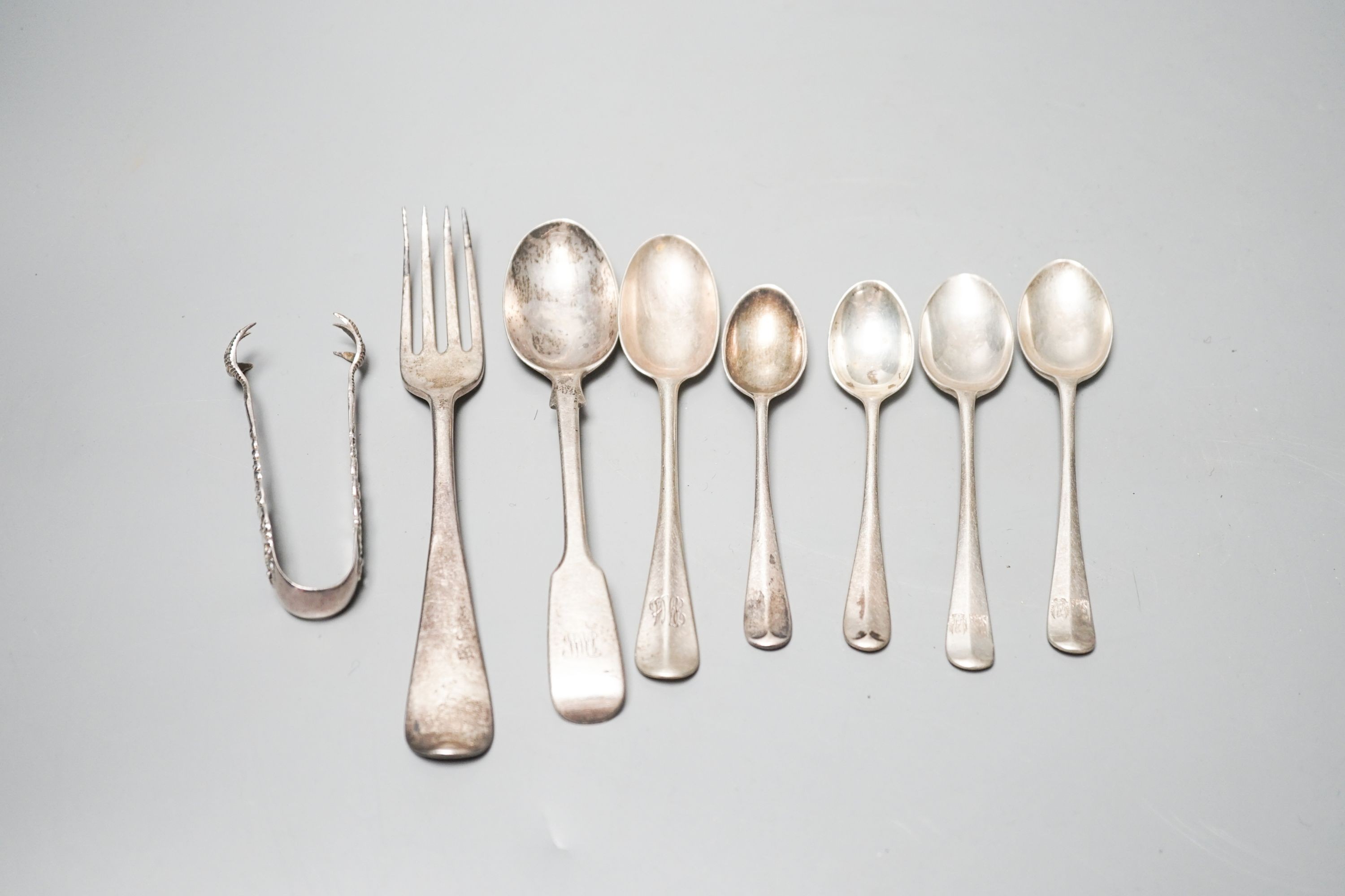 Mixed flatware including a Georgian silver sifter spoon, white metal cake slice, silver three pronged forks etc.